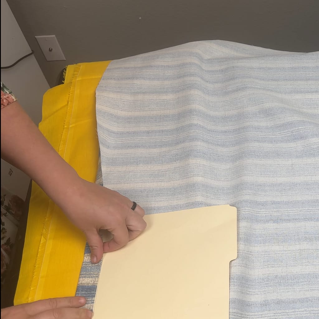 measure the hems and carefully press all the edges of the apron