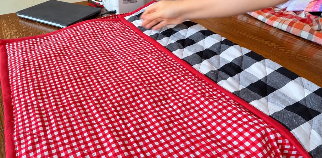 First side of the reading quilt folded inward.