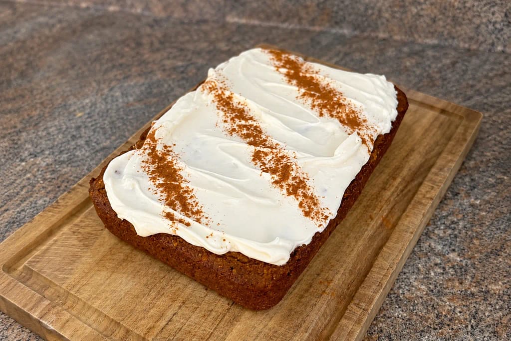 Fresh milled flour pumpkin bread with cream cheese frosting and cinnamon