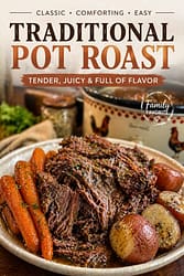 a tender, juicy pot roast, served on a platter with roasted carrots and potatoes