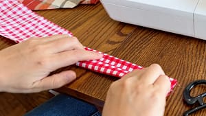 Long handle edges folded toward the center crease.