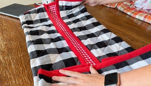 One bound end folded toward the handle attachment area