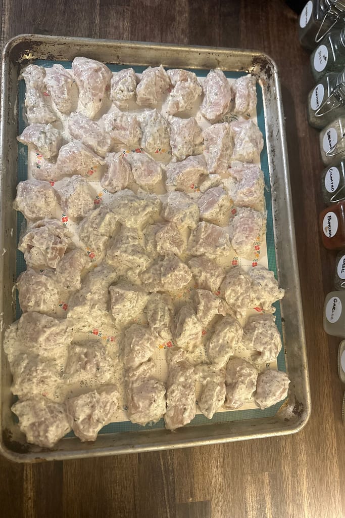spread chicken bites on a baking sheet so there is a bit of space between each one