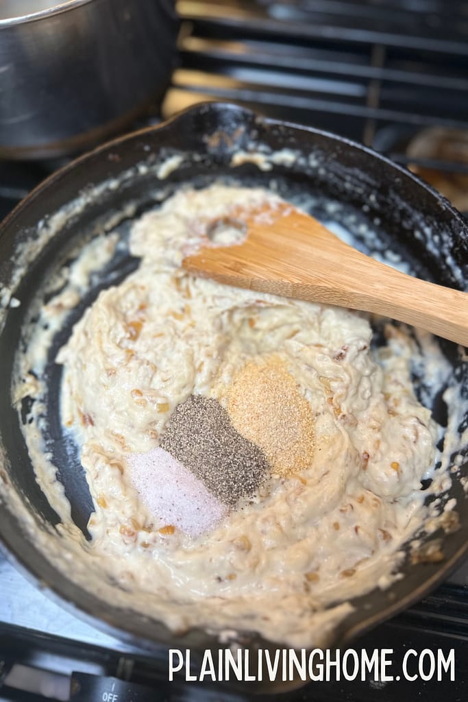 adding herbs and spices to homemade condensed soup