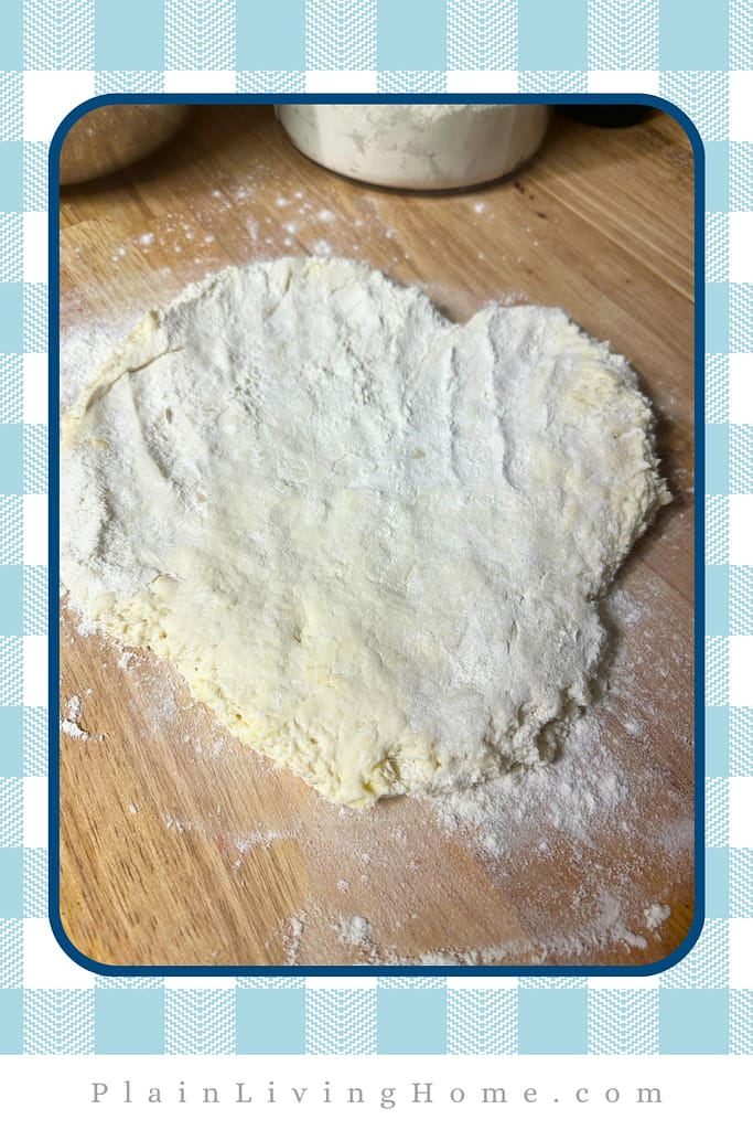 pat the dough out to about half an inch thick