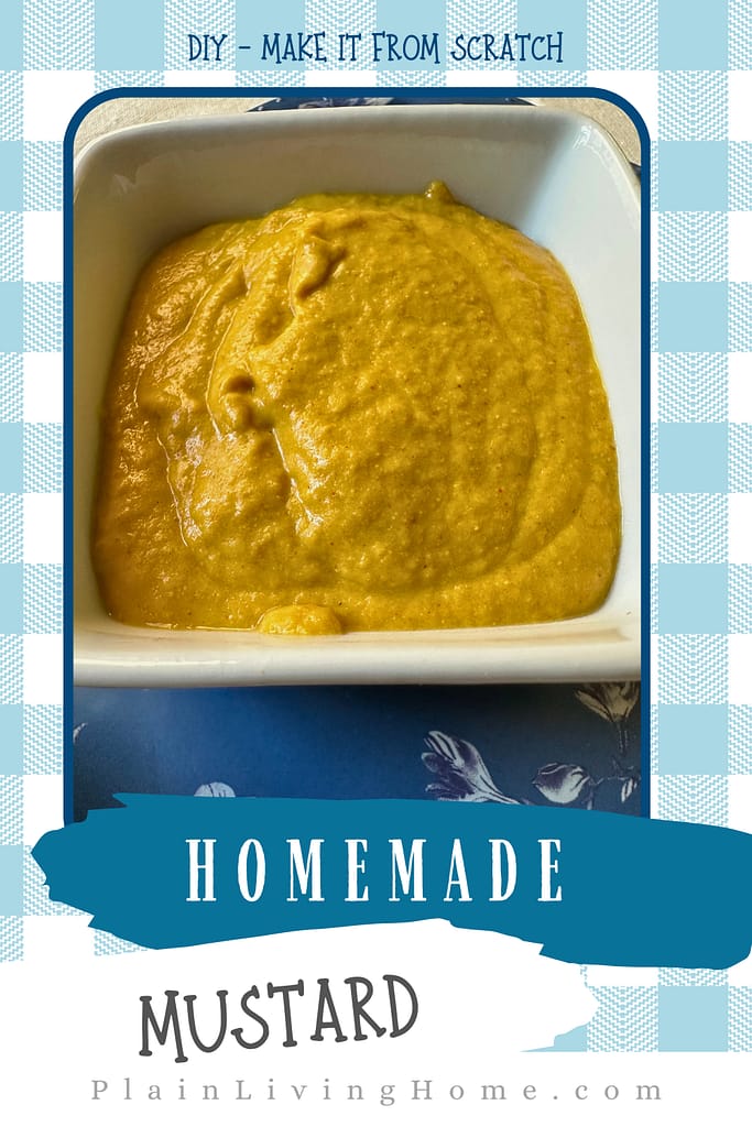 small serving bowl of homemade yellow mustard