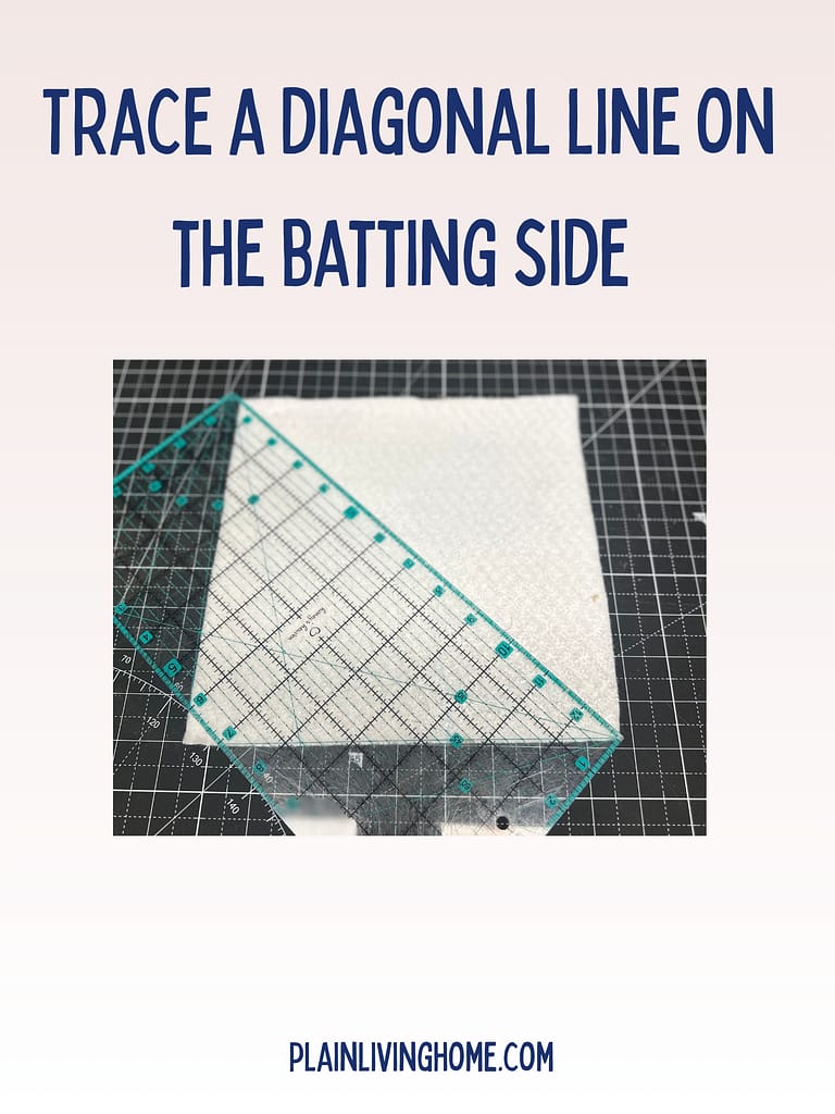 Sewing a diagonal quilting line through hot pad fabric and batting