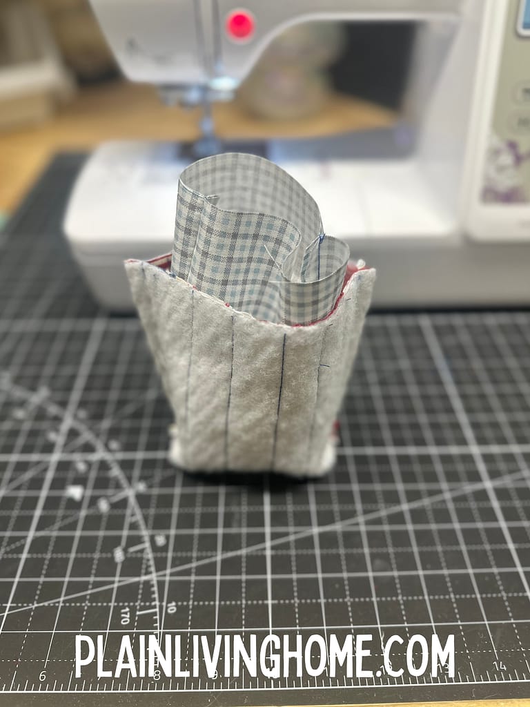 line up the side seams and top edges of the pattern pieces