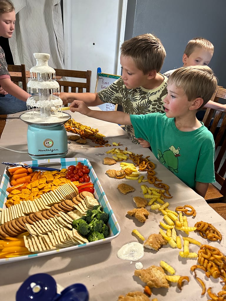 family fun night with ranch dressing served in a chocolate fountain