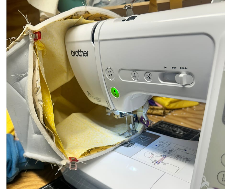 carefully fit the project onto the machine so you can rotate the basket around while you sew