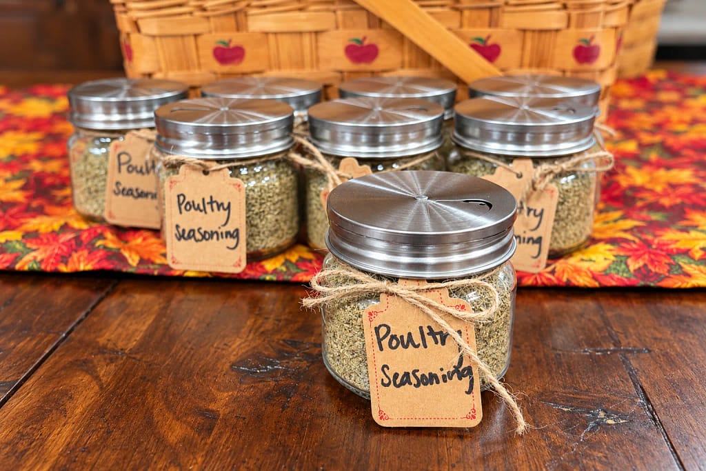 Poultry seasoning jars displayed in an autumn farmers market gift basket