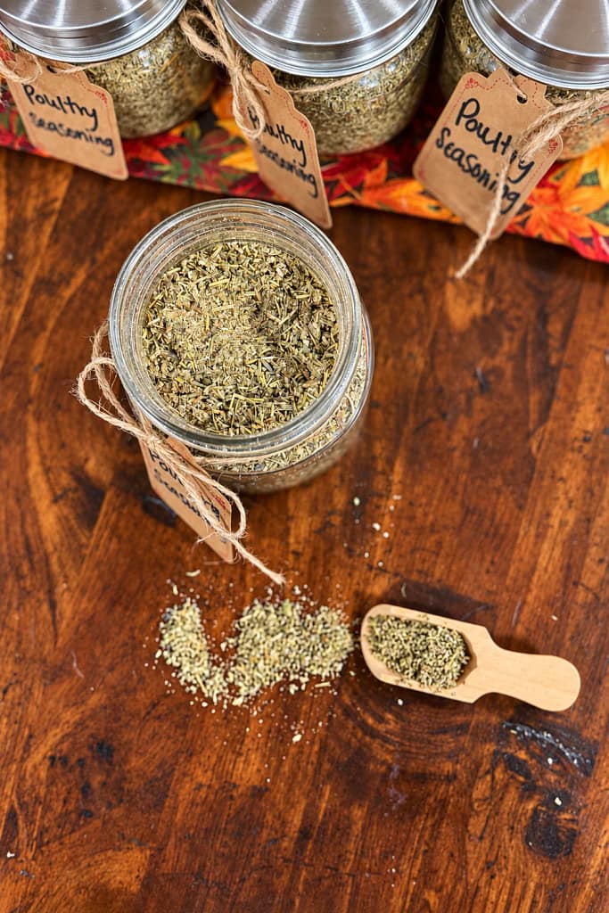 Overhead view of homemade poultry seasoning with sage thyme and rosemary