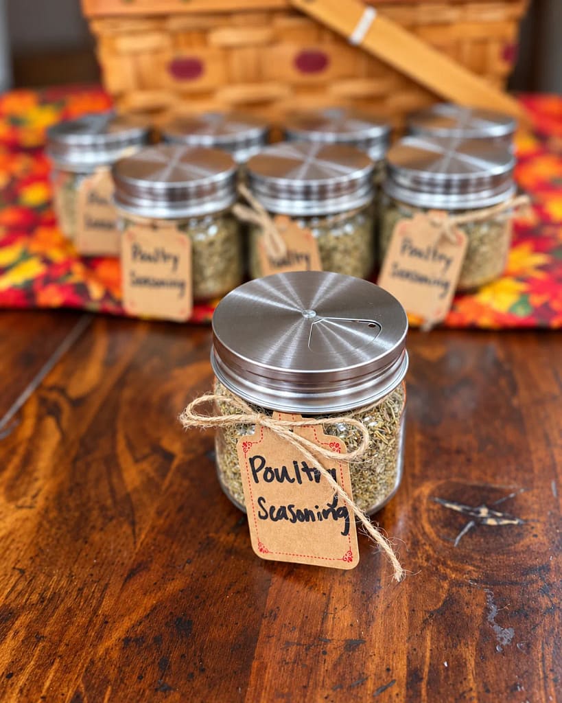 Homemade poultry seasoning gift jars arranged with autumn fabric