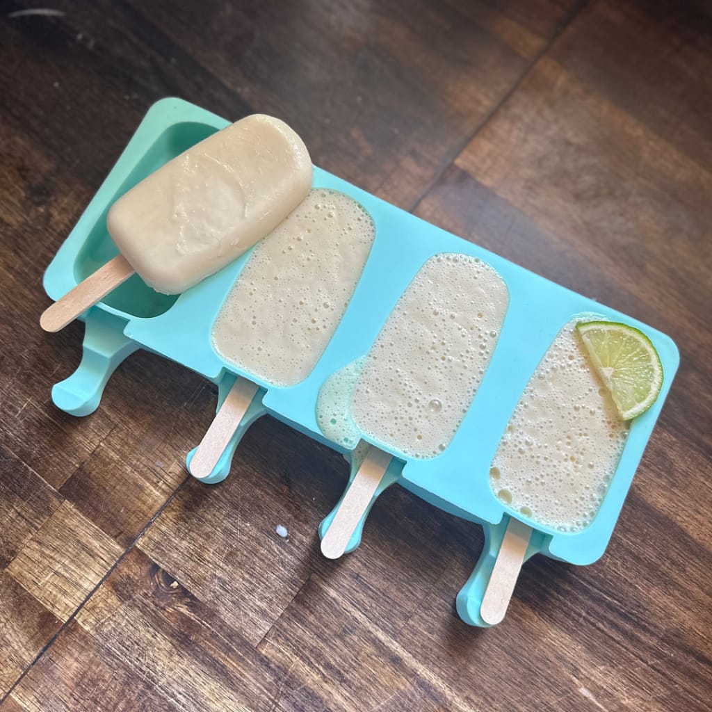 lime popsicles in a silicone mold