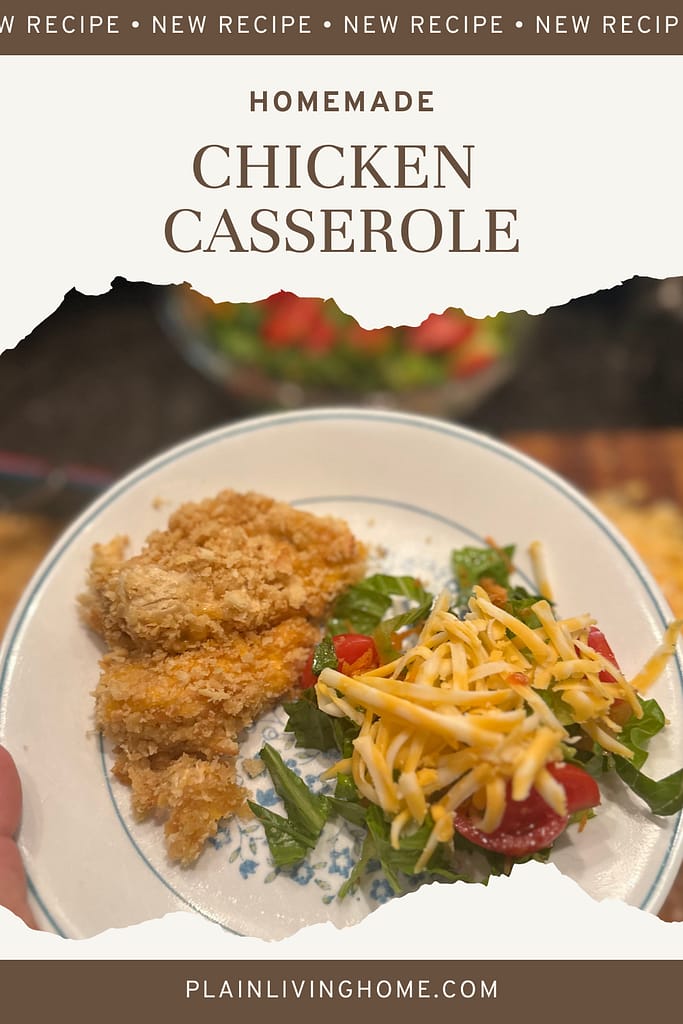 chicken casserole served on a corelle plate with a healthy green salad on the side
