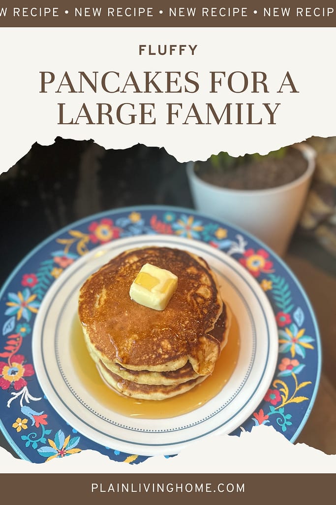 a stack of three extra fluffy pancakes with a pat of butter and drizzled with real maple syrup