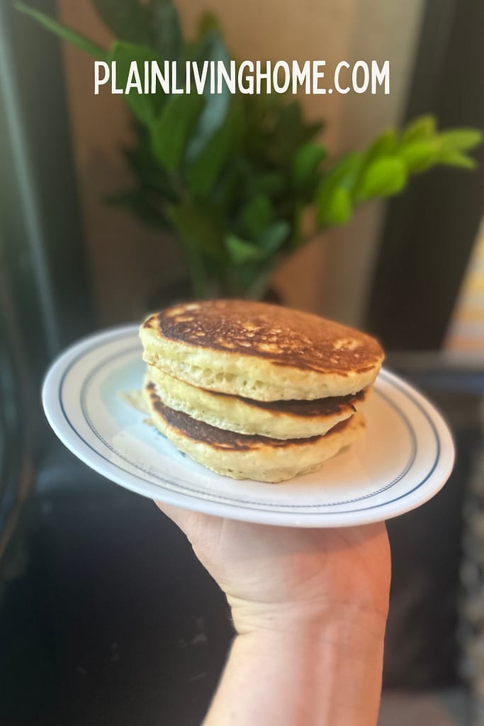 a stack of 3 fluffy pan cakes