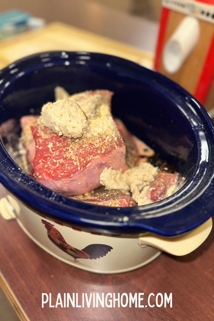 pot roast ready to cook in the crockpot