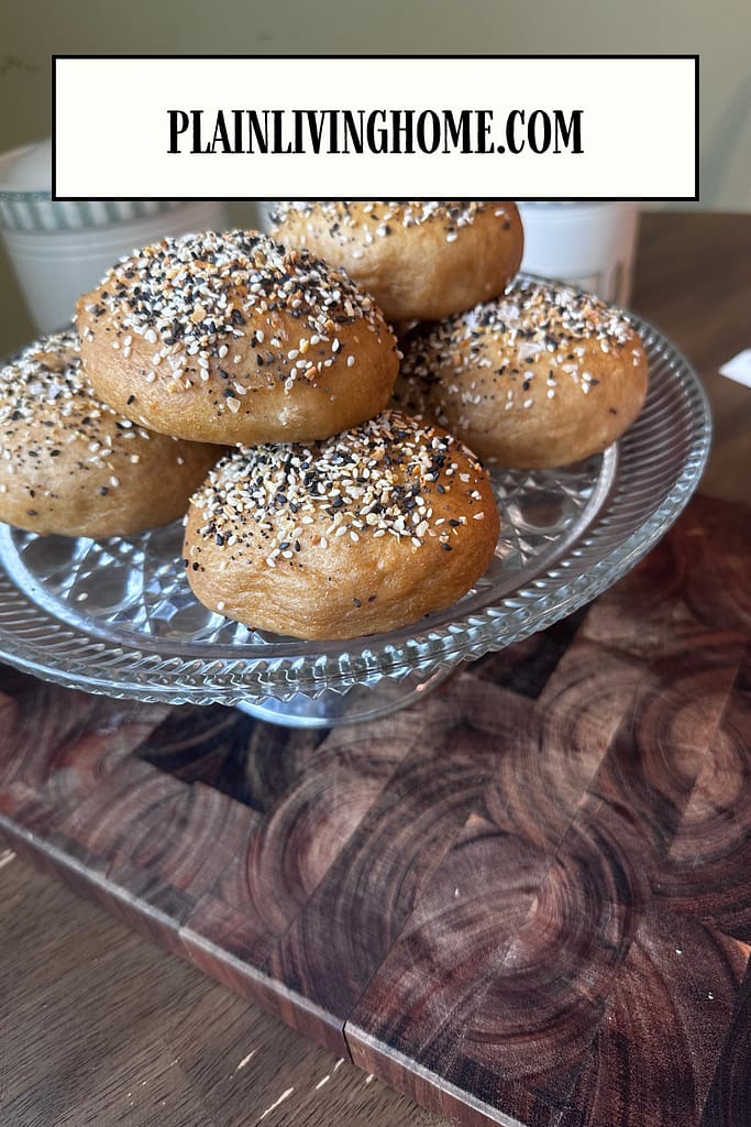 sourdough bagels in a cake serving dish