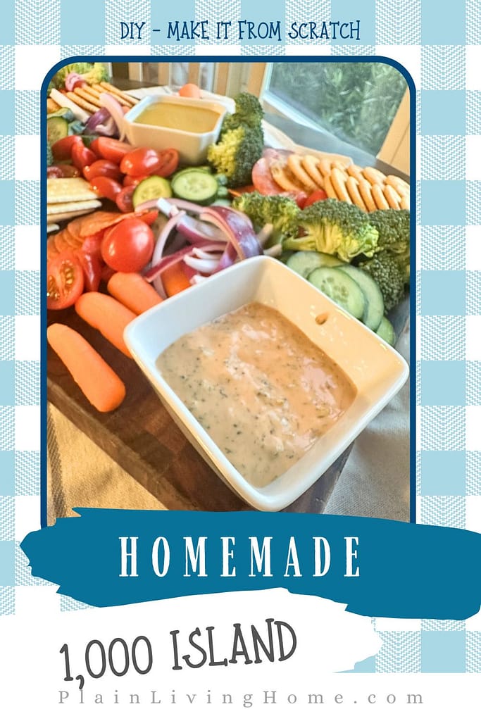 a tray full of fresh veggies served with thousand island dressing for dipping