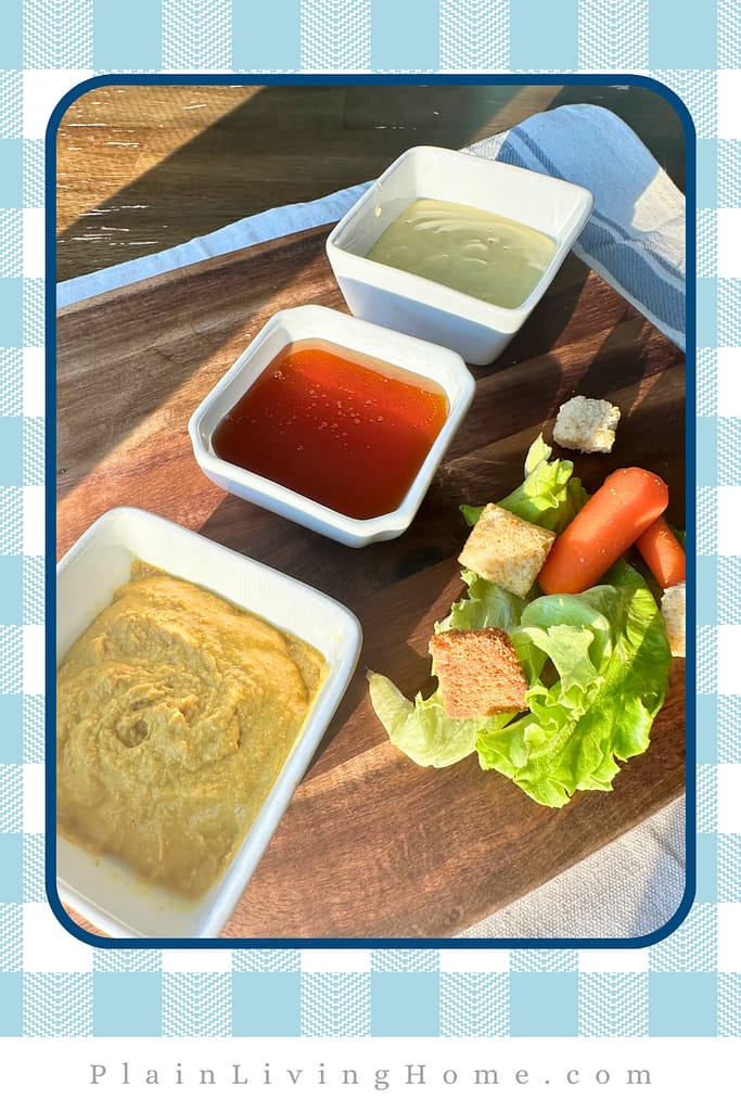 beautiful mayo, mustard, and raw honey measure out with sunlight shining on them