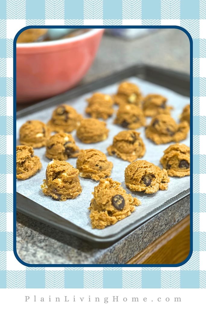 cookie dough scoops on a baking tray