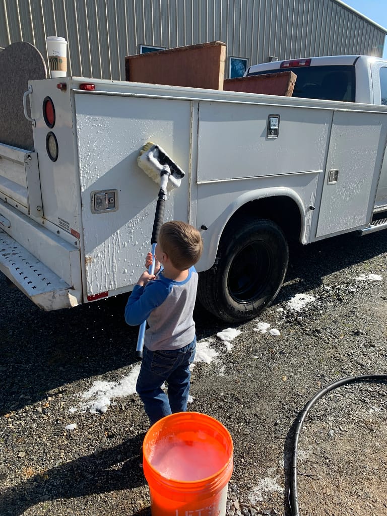 Seth washing the truck