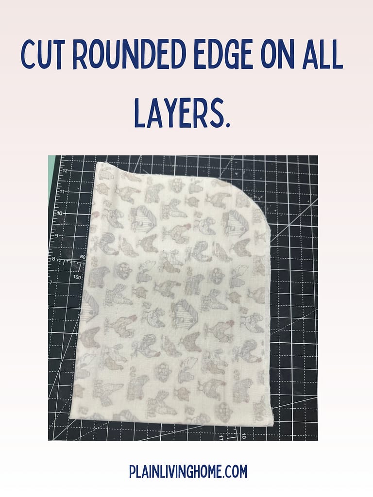 one piece on cotton, folded up, with the corners rounded