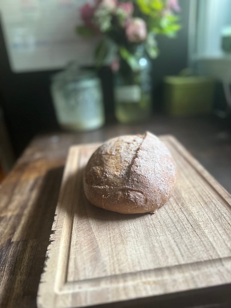 loaf of sourdough bread made with fresh milled hard red wheat