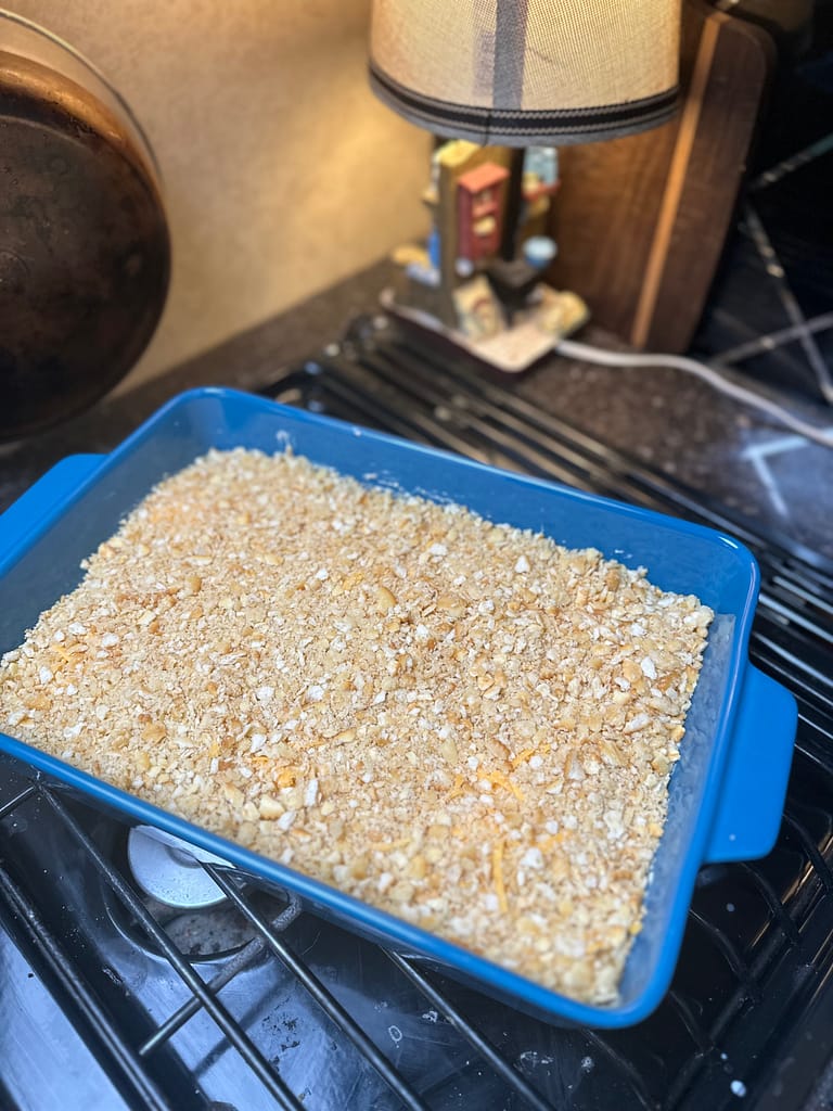 add the ritz cracker topping to the casserole