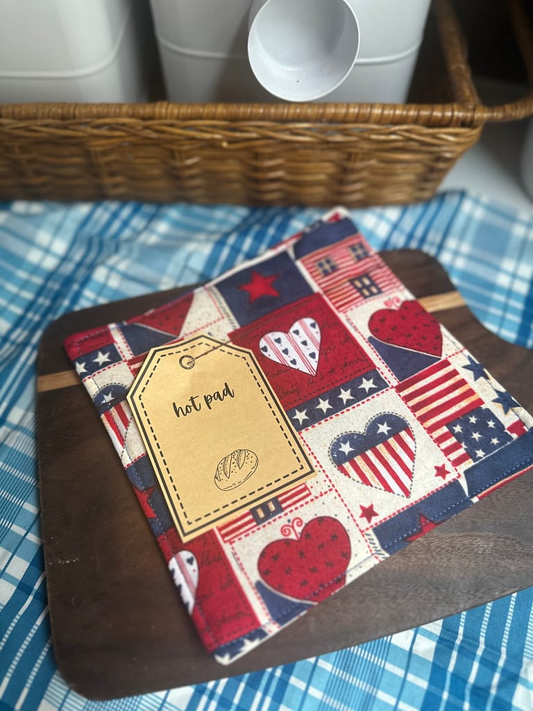 handmade hot pad with a gift tag attached
