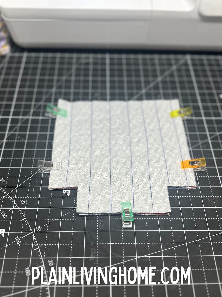 Clip the two exterior panel pieces together and sew the sides and bottom of the jar cozy