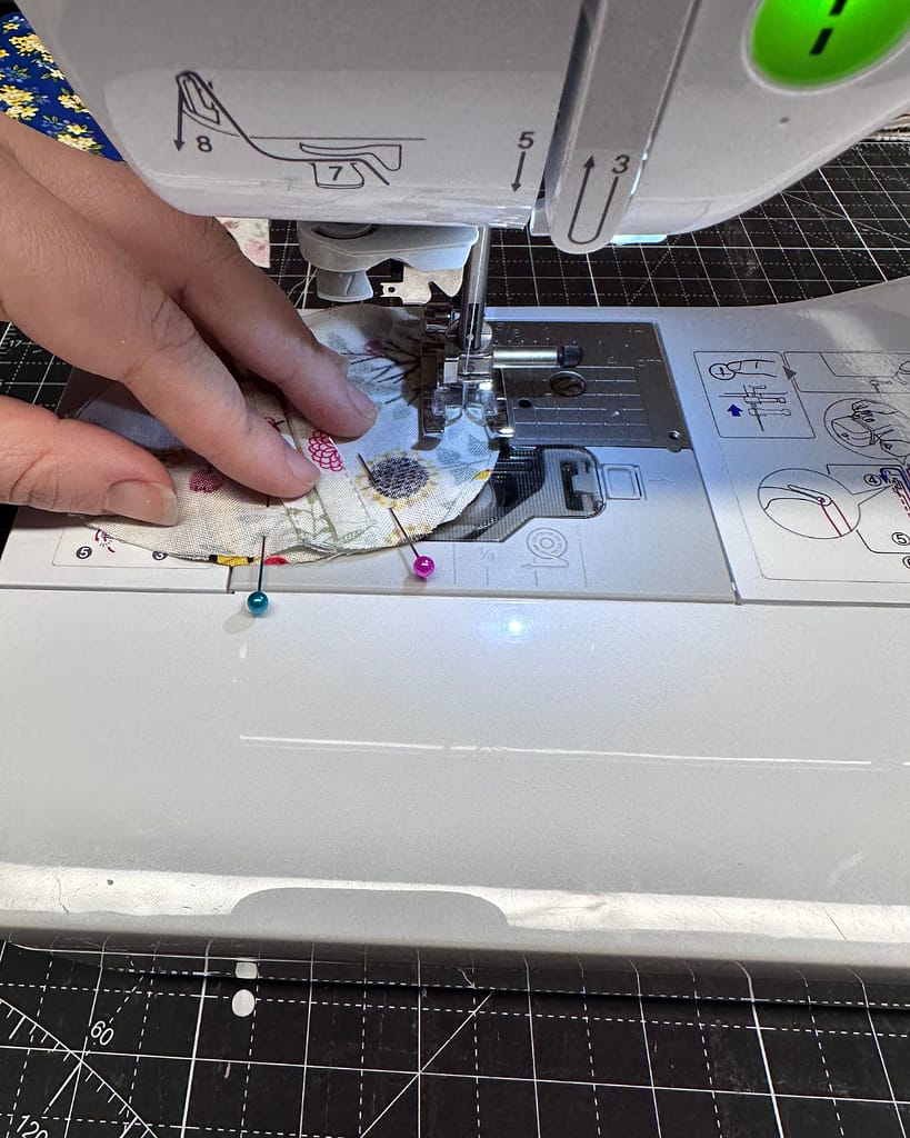 When sewing the round edges of the eggs, use your left hand to direct the fabric by rotating your wrist to move the fabric in a circle