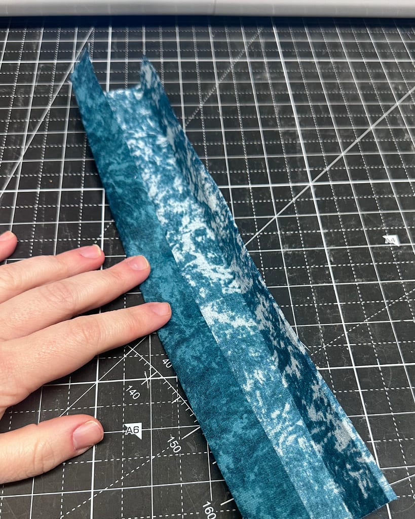 prepare the strap by ironing