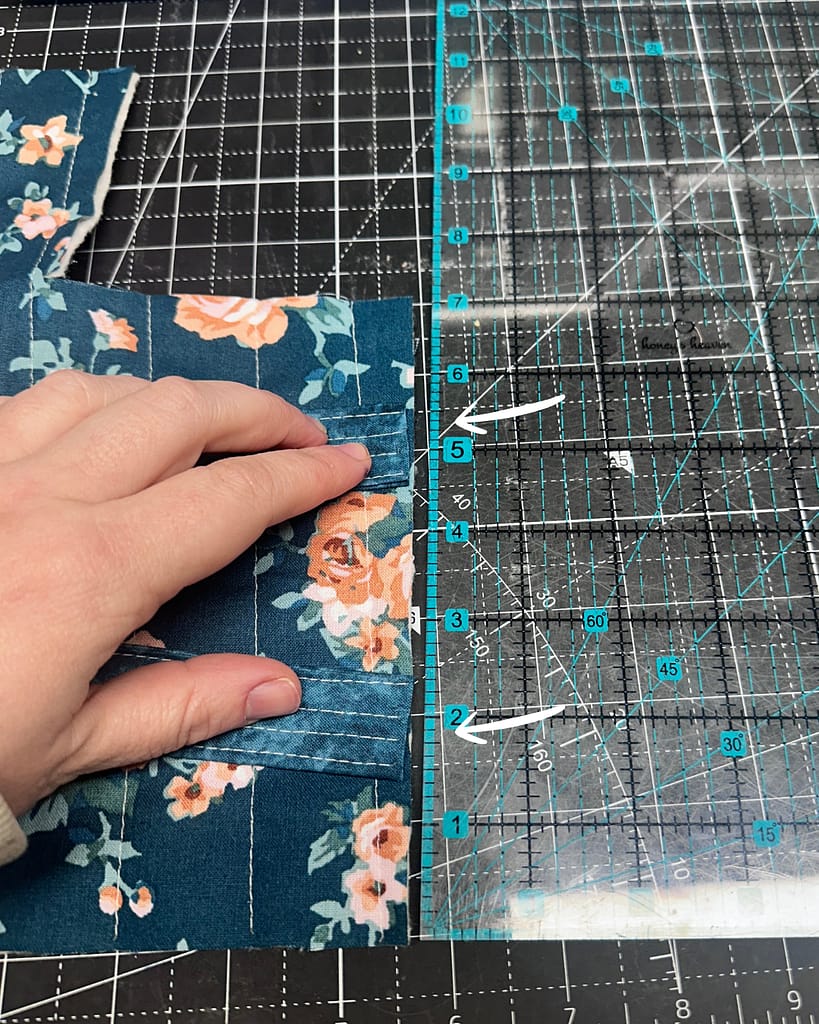 align the handles on the short ends of the main basket fabric